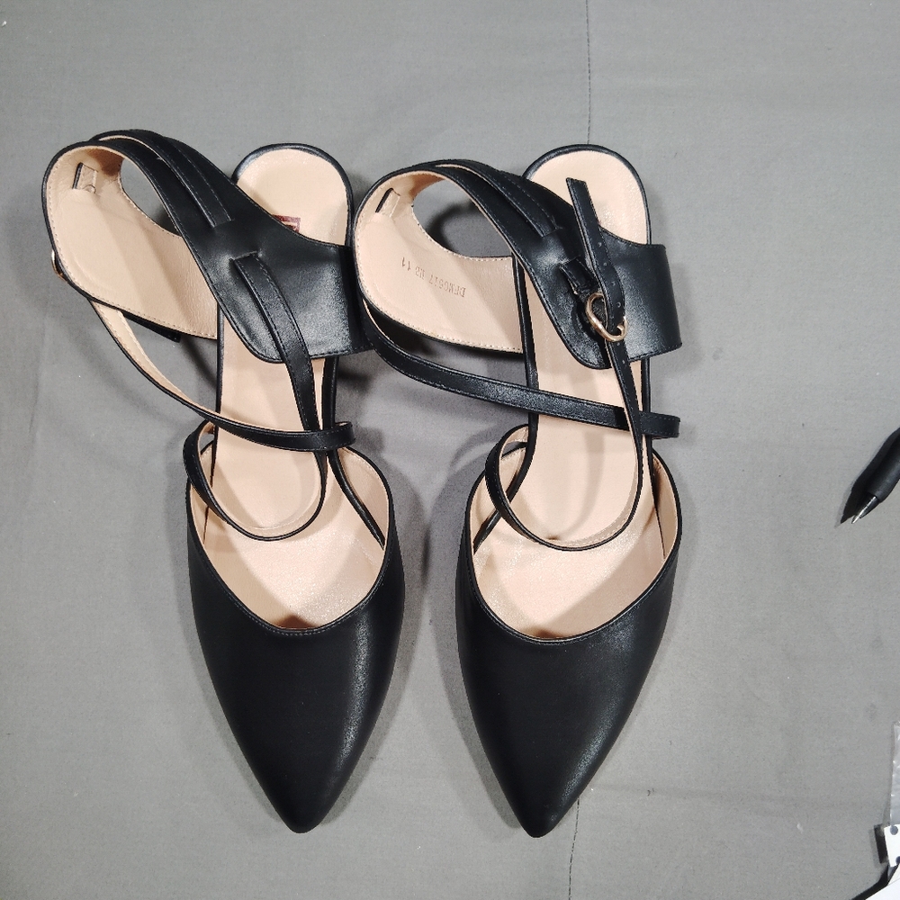 Women's size 11 black flats  pointed toe new half inch heel